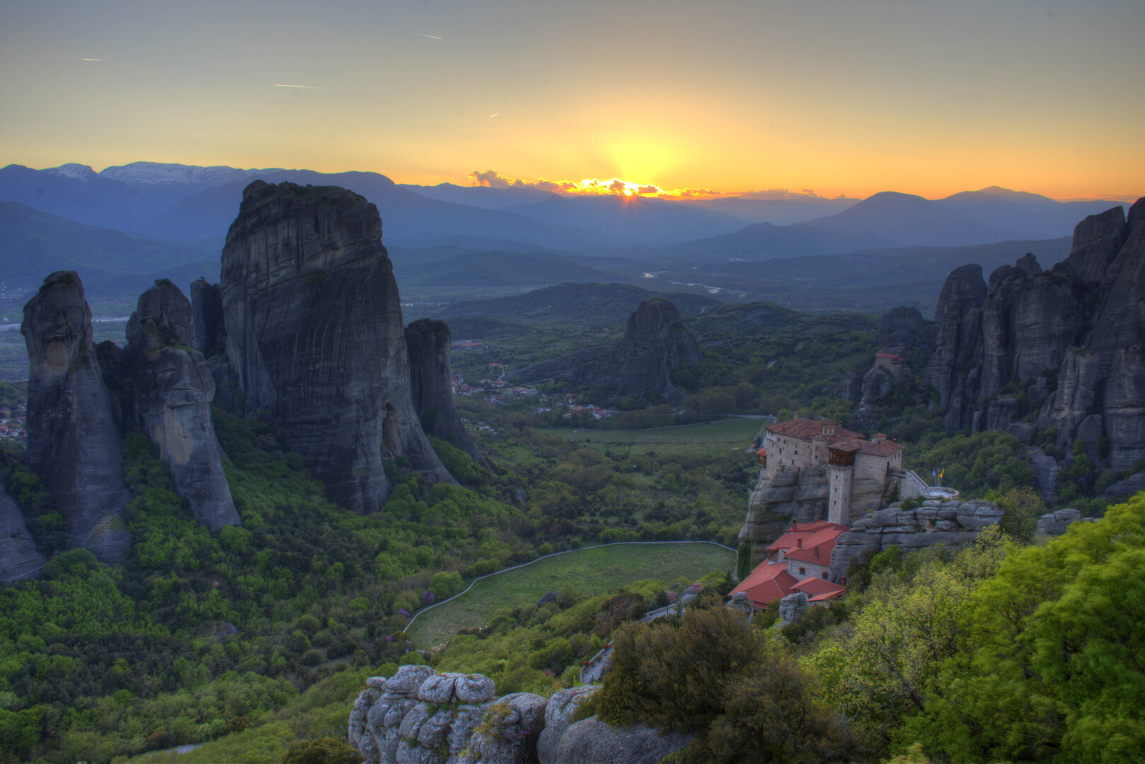 Meteora rock pillars topped with historic cliff-side monasteries